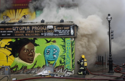Members of the Dublin Fire Brigade tackle a blaze at the Nirvana head shop on Capel Street on Feb. 12, 2010. (Photo by Niall Carson)